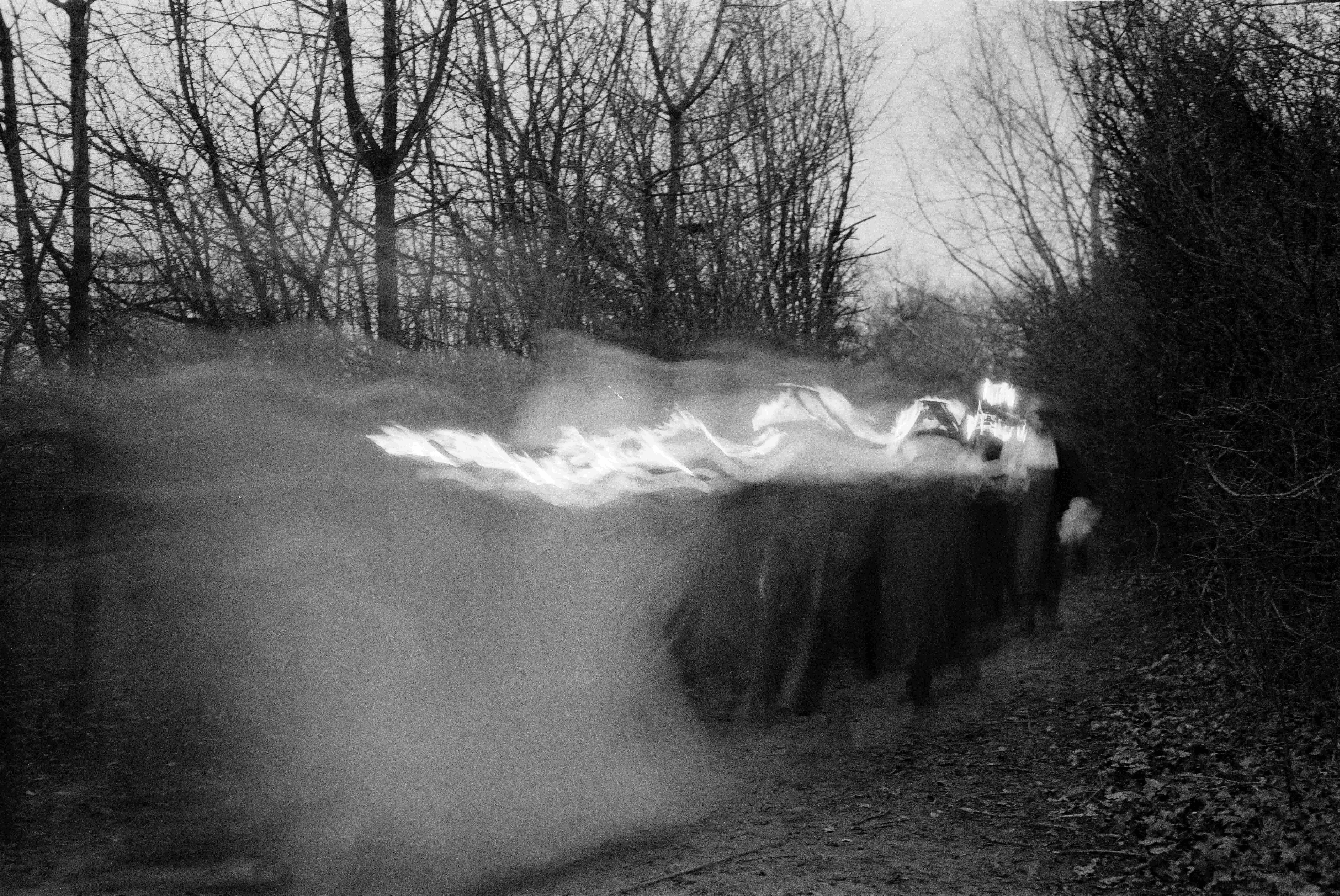 Blurred torch lit procession