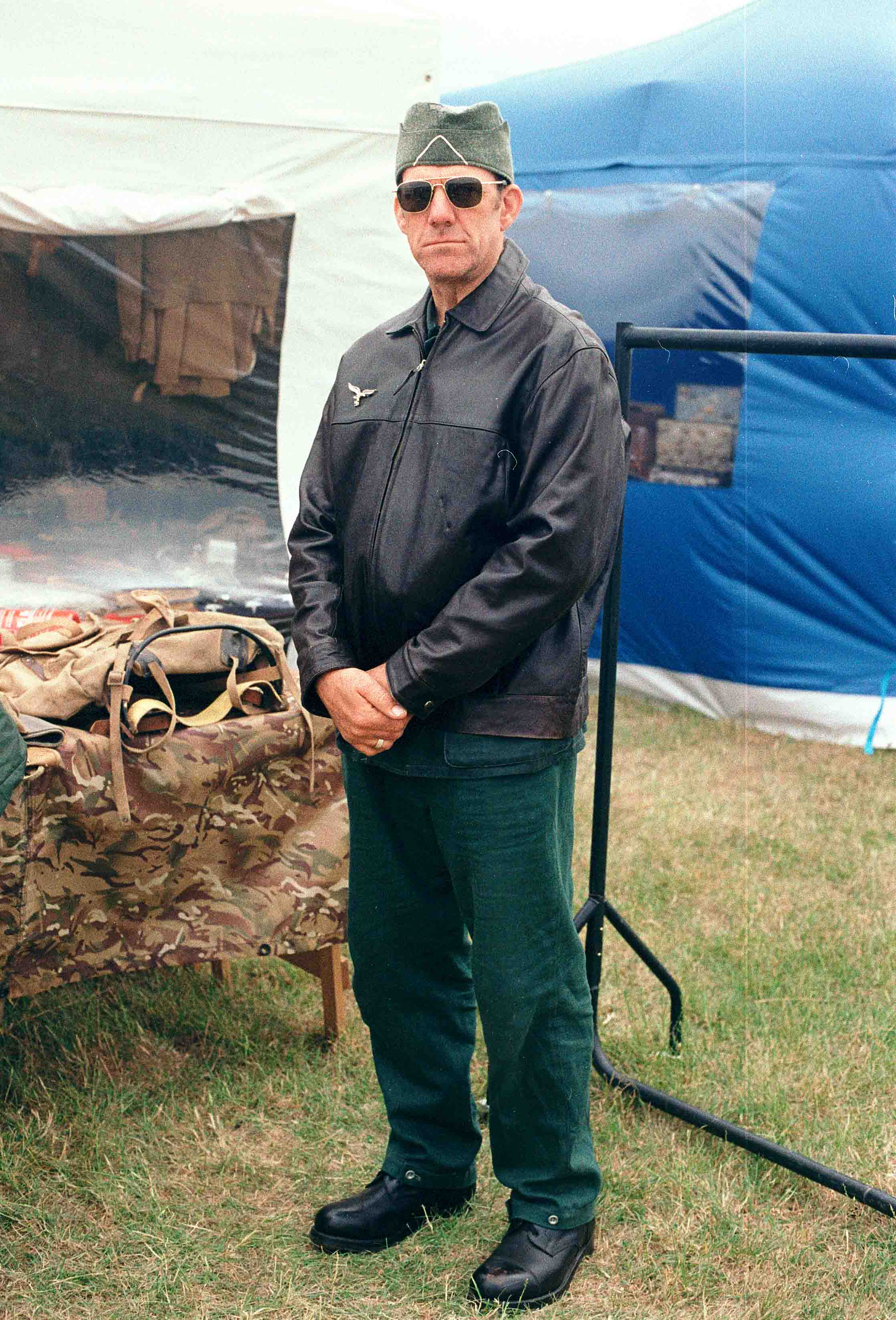 A nazi man in sunglasses resembling hunter S Thompson