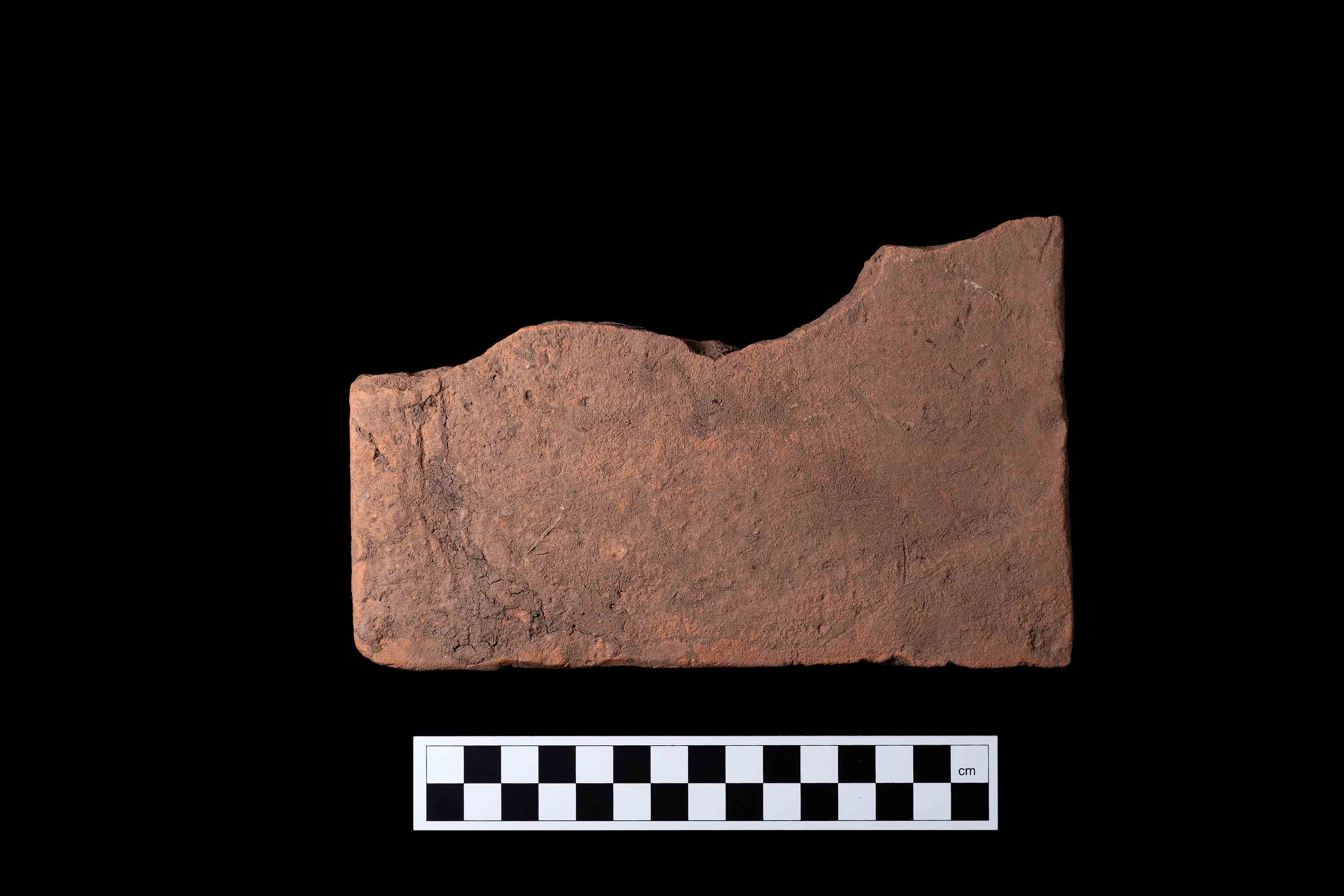 2nd Medieval clay roof tile, broken, reverse