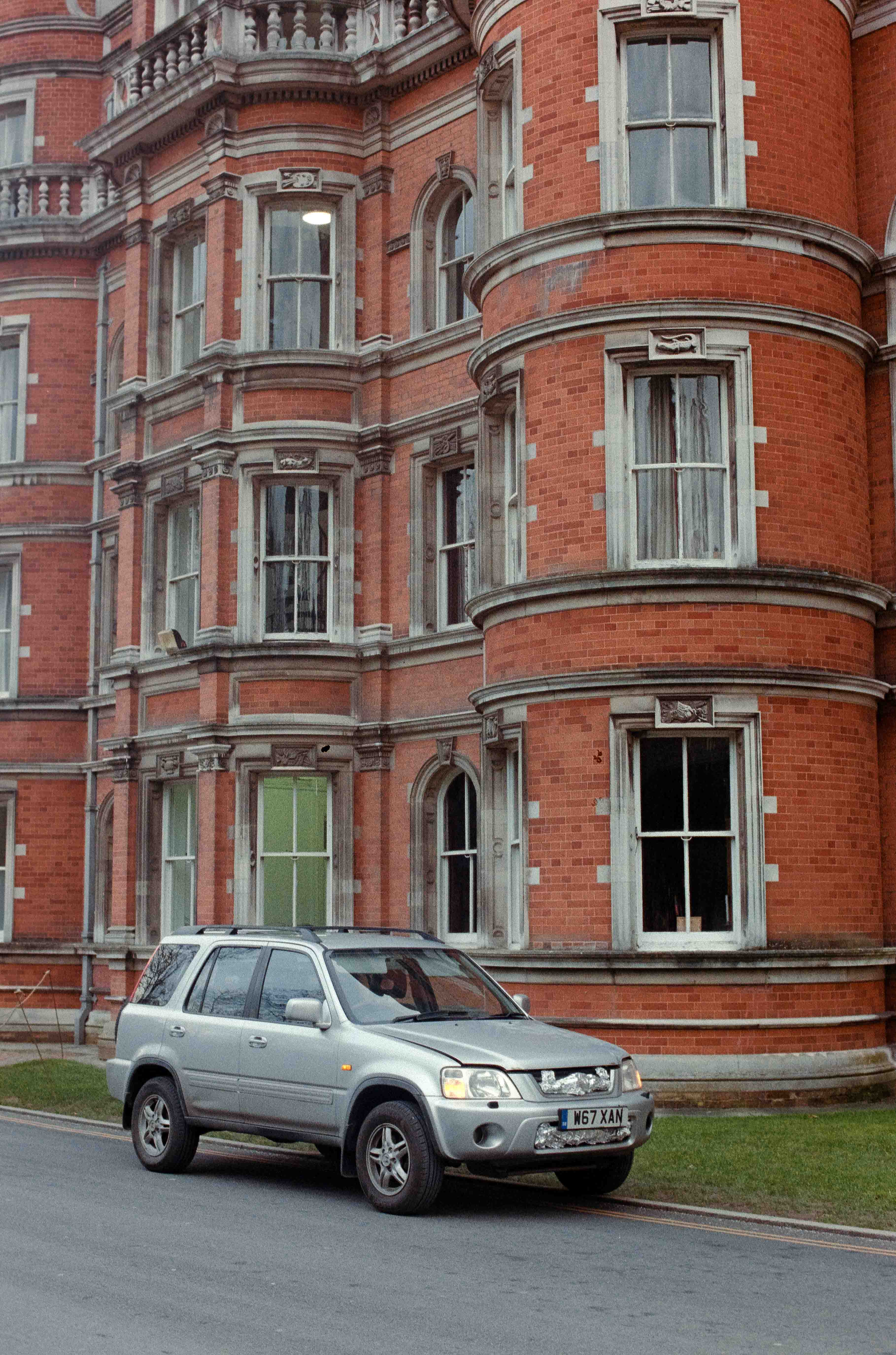 a car covered in tinfoil outside of royal holloway